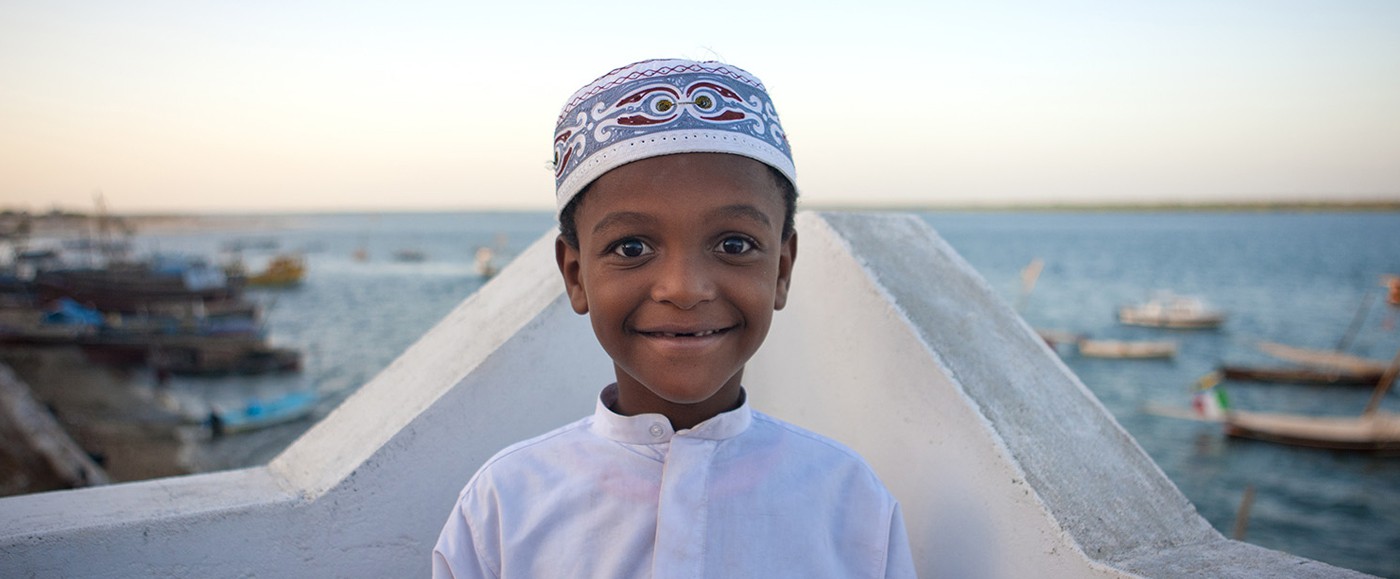 Sunday clothes on, Friday ones in fact for this schoolchild who is in week-end.