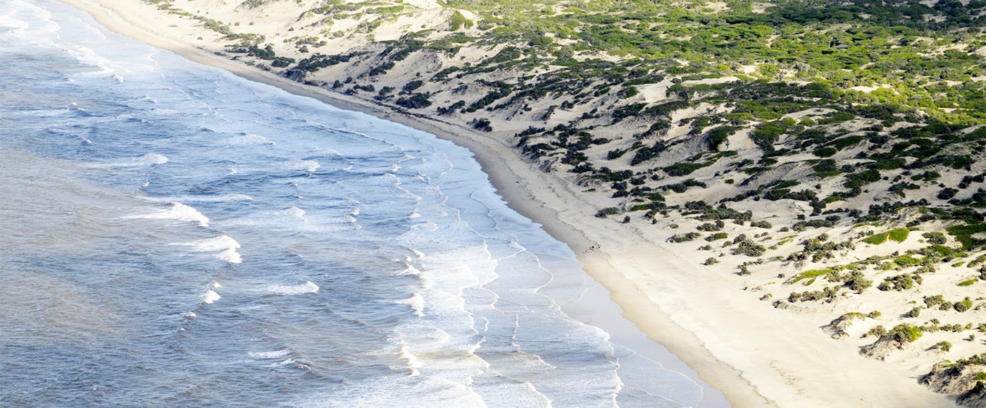 Shella beach, a bit more far outside the bay here, more waves and wild, surfers do love it 